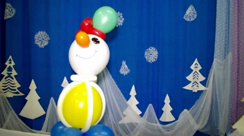 Snowman of balls on a blue background Stock Footage 58627431