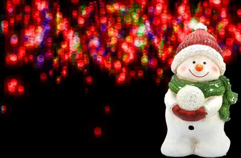 Snowman on a blurred background Stock Photos