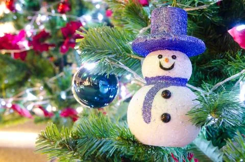 Snowman on christmas tree Stock Photos