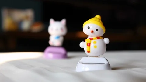 Snowman dancing on bed Stock Footage