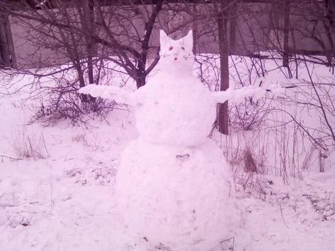 Snowman in the form of a cat Stock Photos