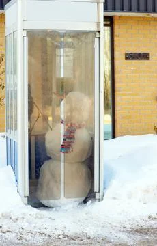 Snowman phoning. Stock Photos