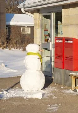 Snowman at post office. Stock Photos