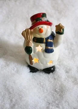 Snowman in snow Stock Photos