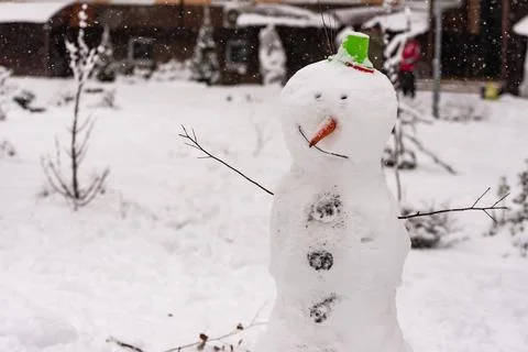 Snowman in town Stock Photos