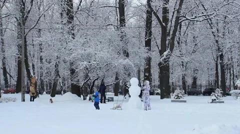 Snowman in a winter park. Stock Footage