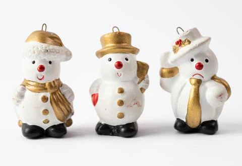Snowmen on a white background Stock Photos