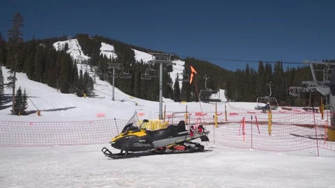 Snowmobile at base of Eldora Ski Resort Video stock 243532291