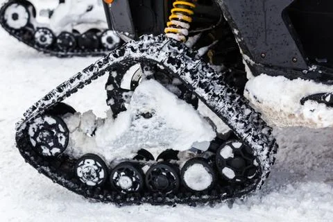 Snowmobile caterpillar close-up Stock Photos