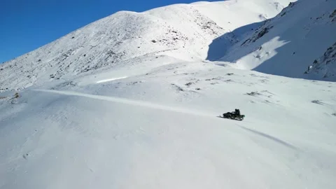 Snowmobile Climbing Remote Alpine Road in New Zealand Stock Footage 345054188