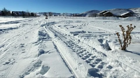 Snowmobile coming at camera Stock-Footage 62769311