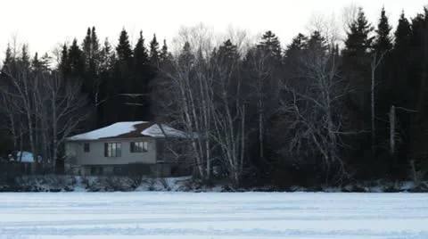 Snowmobile drives past Stock Footage 21737376