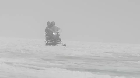 Snowmobile Driving Through the Blizzard Stock Footage 236726007