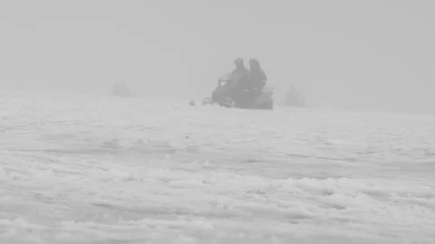 Snowmobile Driving Through the Blizzard Stock Footage 236726015