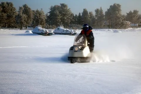 Snowmobile at full speed Stock Photos