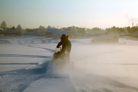 Snowmobile at full speed Stock Photos
