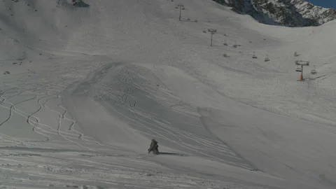 Snowmobile going up the ski slope Video stock 346055966