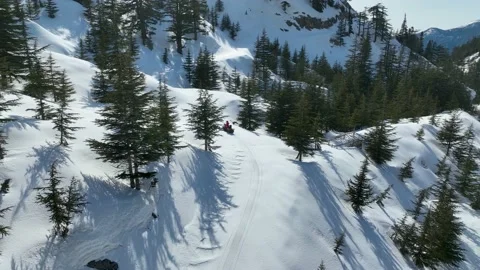 Snowmobile high in the mountains aerial view 4 K Vidéo 226506774