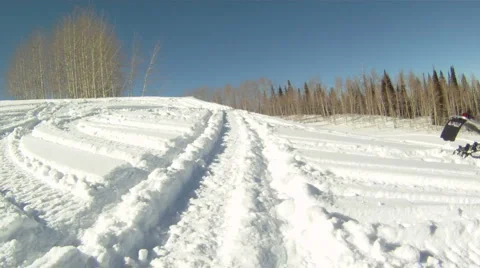 Snowmobile jump slow P HD 09 Stock Footage 1077084