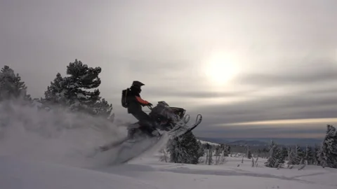 Snowmobile jumps Stock Footage 149361147