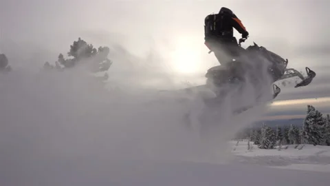 Snowmobile jumps Stock Footage 149361209