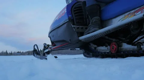 Snowmobile leaves Stock Footage 61046515