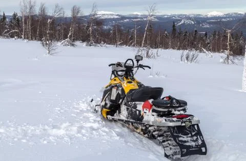 Snowmobile in the mountains Stock Photos