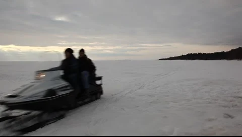 Snowmobile moves on the camera Stock Footage 1807004