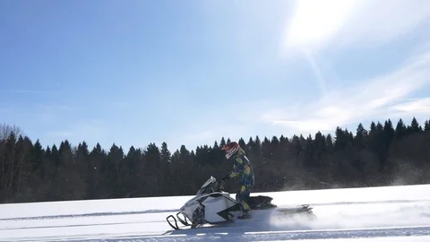 Snowmobile moving on the field Stock Footage 89641220