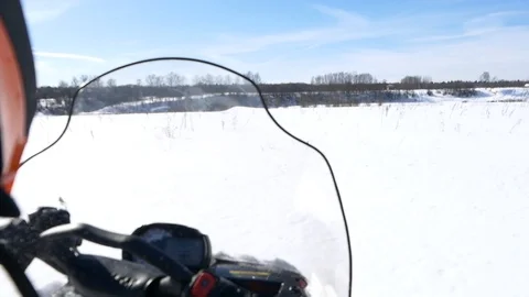 Snowmobile moving on the field Stock Footage 89641257