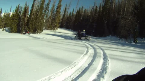 Snowmobile out of forest HD GP 10 Stock Footage 1057432