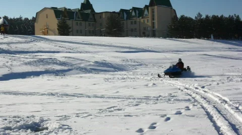 Snowmobile quickly goes Stock Footage 374564