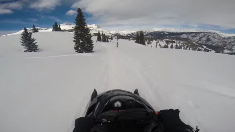 Snowmobile Ride Towards Mountain Front facing view Video stock 201417774
