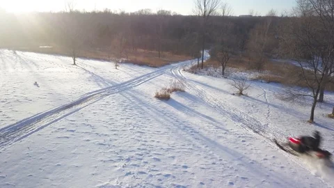 Snowmobile Riding Into Sunset 動画素材 87047775