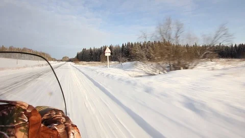 Snowmobile is off-road in the taiga Stock Footage 87239654