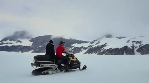 Snowmobile on snow field - Alaska, two footage Stock Footage 39983255