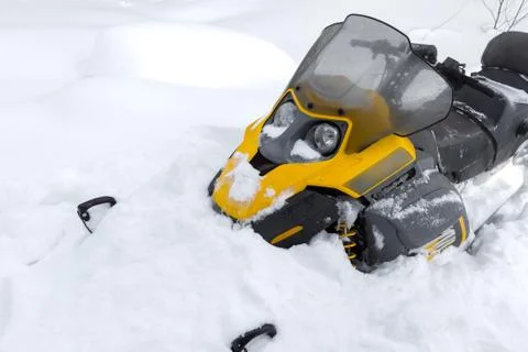 Snowmobile in snow. Stock Photos