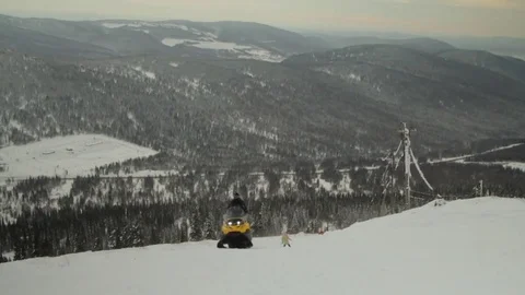 Snowmobile. Snowmobile uphill 動画素材 83121516