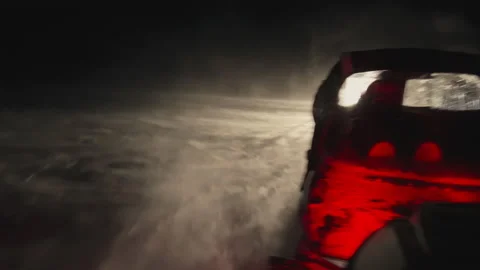 Snowmobile at speed. Red sun at sunset 스톡 동영상 219589199