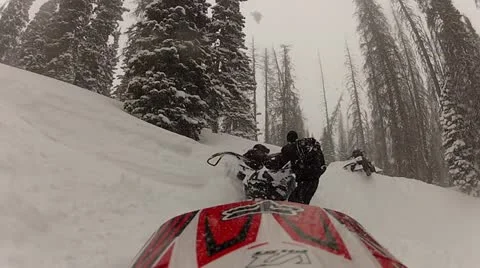 Snowmobile stuck upside down in the snow 2.mp4 Stock Footage 10929716