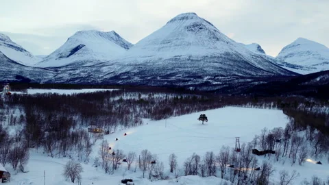 Snowmobile Tour Through Arctic Mountains near Tromsø Norway Stock Footage 344370185