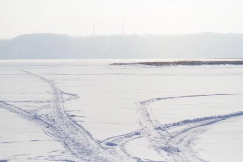 Snowmobile track marks on the snow Foto stock