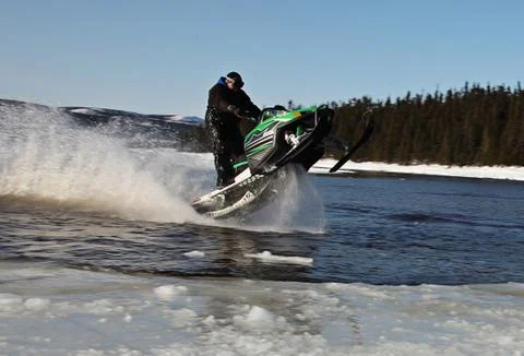 Snowmobile in winter Stock Photos