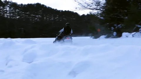 SNOWMOBILER ON TRAIL Stock Footage 104017992