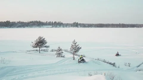 Snowmobiles in the field Stock Footage 59685567