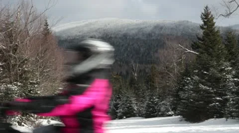 Snowmobiles in front of mountain Stock Footage 21736638