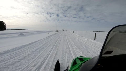 Snowmobiling Onboard View Through an Open Field Vídeos de archivo 130218010