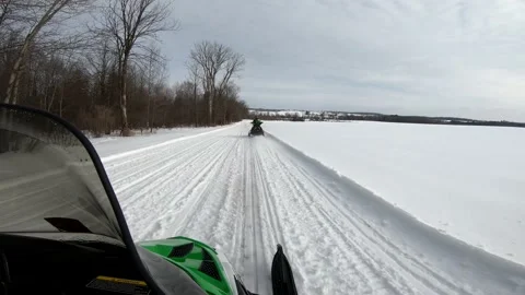 Snowmobiling Onboard View with a Treeline on Left Video stock 130218608