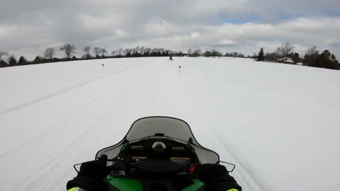 Snowmobiling POV of Open Field up to a Road Vídeos de archivo 130219026