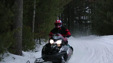 SNOWMOBILING ON A TRAIL Stock Footage 35243985